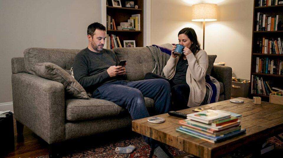 Couple relaxing together after kids’ bedtime